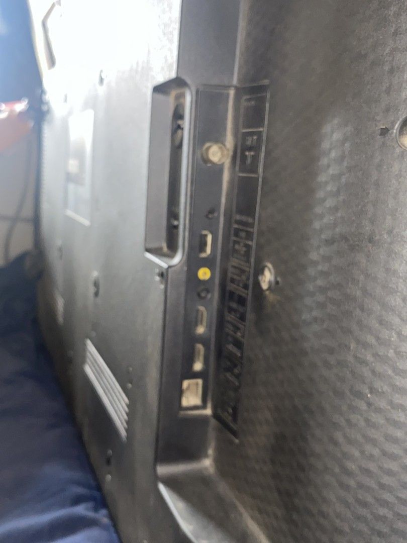 Sharp Aquos TV (Category: TV) located in San Jose del Monte. Submitted by letitoutttt (Listing ID 1445194731, Image 3). Description: - Sharp Aquos TV - Approximately 32-inch screen size - Features HDMI and USB ports - Has WiFi, Youtube, Netflix, Browser - In good working condition - Selling due to upgrade, bought in 2019 - Pick up or delivery.