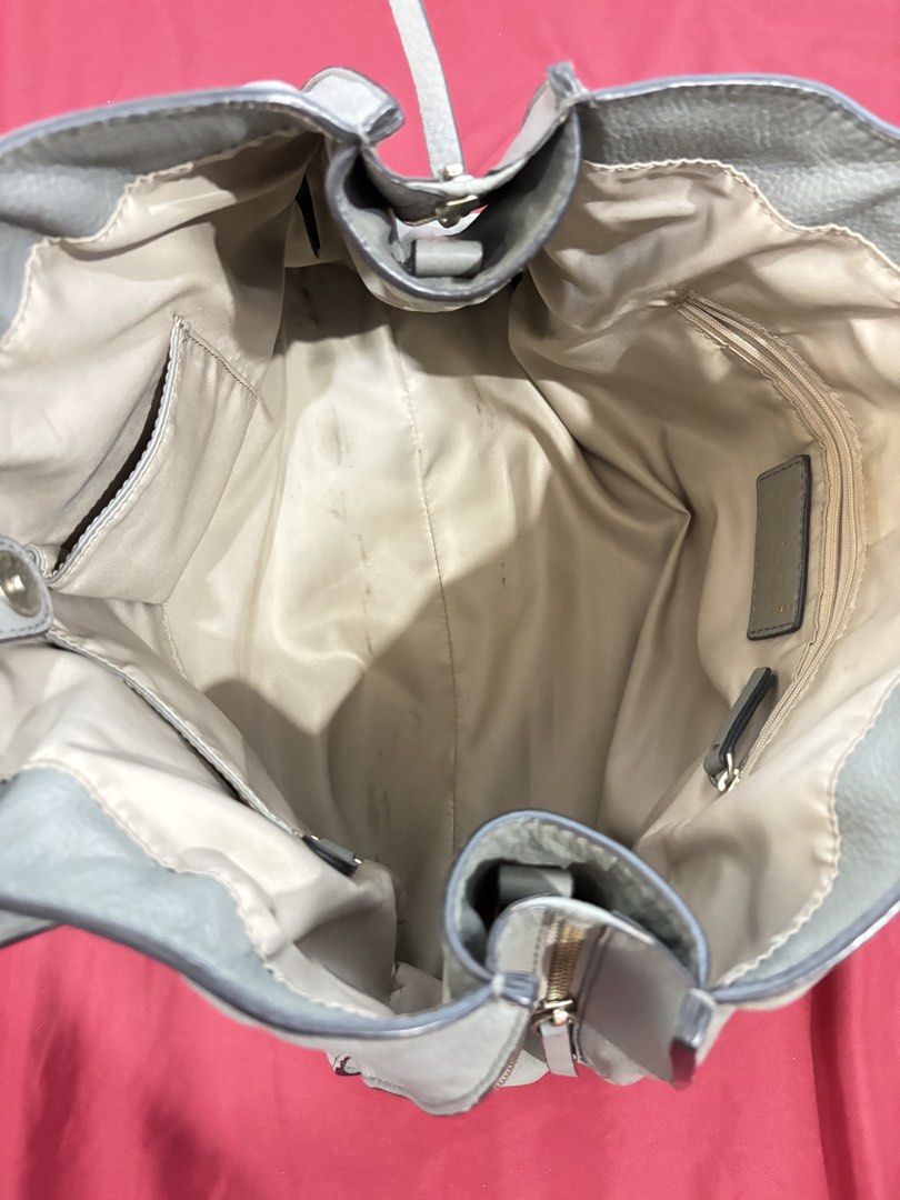 Smaak Genuine Leather Tote Bag (Category: Tote Bags) located in Los Banos. Submitted by tripleceedoubletwo (Listing ID 1445084717, Image 3). Description: - Light grey genuine leather tote bag - Spacious interior - Zippered pocket at the back - Ideal for everyday use or travel - Dimensions: 15 x 4.5 x 12 inches - MOP: Gcash/BPI.