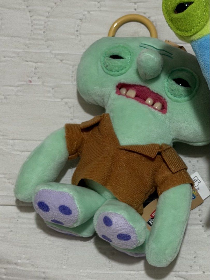 SpongeBob SquarePants Squidward & Gary Plush Toys (Category: Plushies & Soft Toys) located in Manila. Submitted by luisanne_lua (Listing ID 1445166291, Image 1). Description: - Adorable plush toys featuring Squidward and Gary from SpongeBob SquarePants. - Squidward is dressed in his signature brown shirt. - Gary the Snail is depicted upside down. - Ideal for fans of the show. - Great for collecting or as a display piece..
