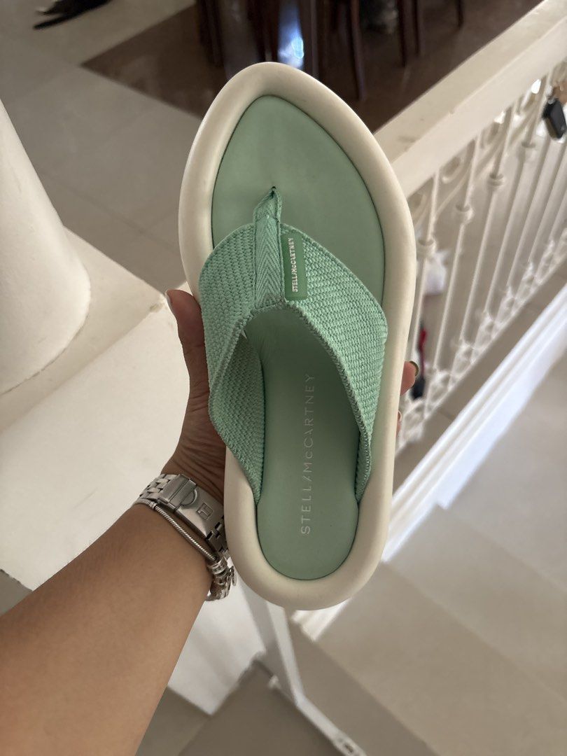 Stella McCartney Mint Green Platform Flip Flops Sandals Size 36 (Category: Sneakers & Footwear) located in Tarlac. Submitted by therusticaddict (Listing ID 1445085176, Image 1). Description: - Stella McCartney flip flops - Color: Mint Green - Size: 36 - Features: Platform sole with white trim - Condition: Good, with minor scuffs on soles from normal wear - Style: Comfortable and stylish for everyday wear.