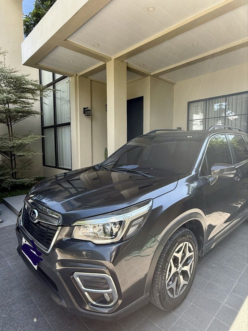 Subaru Forester 2.0 i (A) (Category: Used Cars) located in Quezon City. Submitted by MayO. (Listing ID 1445102231, Image 2). Description: Selling Subaru Forester 2.0i-l 2019 AWD AT 1st owned-DIRECT seller Dark gray metallic Gasoline Push start button MG square italian leather line Still insured until june 2027- PhilBritish New Michelin tires-estimated less than 5,000kms Tools and jack included NEVER NABAHA and BANGA! Original paint(whole body) Is