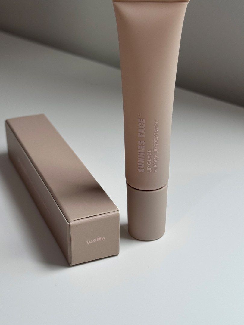 sunnies face lip glaze [lucite] (Category: Makeup) located in Quezon City. Submitted by declutterbyraven (Listing ID 1445109102, Image 2). Description: sunnies face lip glaze — P250 [ shade: lucite ] ⋆brand new | just an extra.