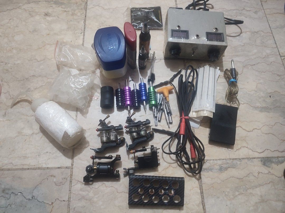 Tattoo Machine Kit with Power Supply and Accessoriess (Category: Craft Supplies & Tools) located in Manila. Submitted by regzareub (Listing ID 1445182932, Image 2). Description: - Complete tattoo kit bundle - Includes multiple tattoo machines - Power supply unit - Various grips and cables - Tattoo ink bottles included - Other small accessories - Everything you need to get started lahatan na Po guys ito .