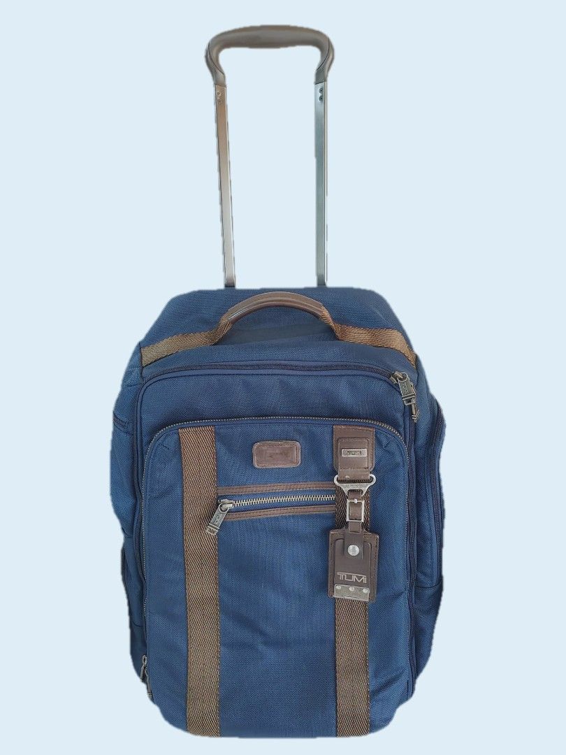 TUMI AUTHENTIC BAGS (Category: Luxury Bags & Wallets) located in Iloilo. Submitted by blancroger_tumi (Listing ID 1445050404, Image 2). Description: - Tumi Authentic Bags - Includes: Rolling carry-on, w way Tote/Backpack, backpack, Body bag - Material: Blue Ballistic nylon with brown leather accents - Versatile: Ideal for travel or daily use - Authentic.