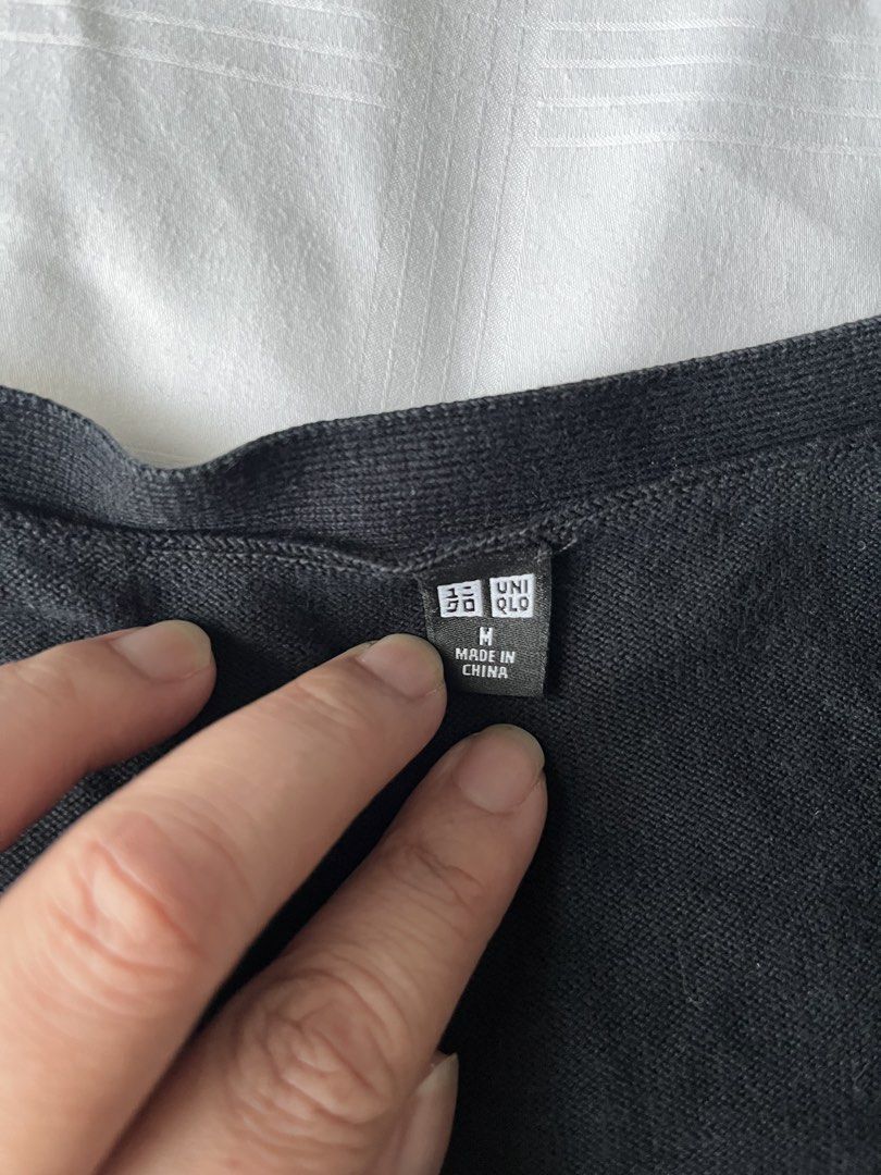 Uniqlo Black Cardigan (Category: Coats, Jackets and Outerwear) located in Quezon City. Submitted by aimeeob (Listing ID 1445156360, Image 2). Description: Cardigan Black.