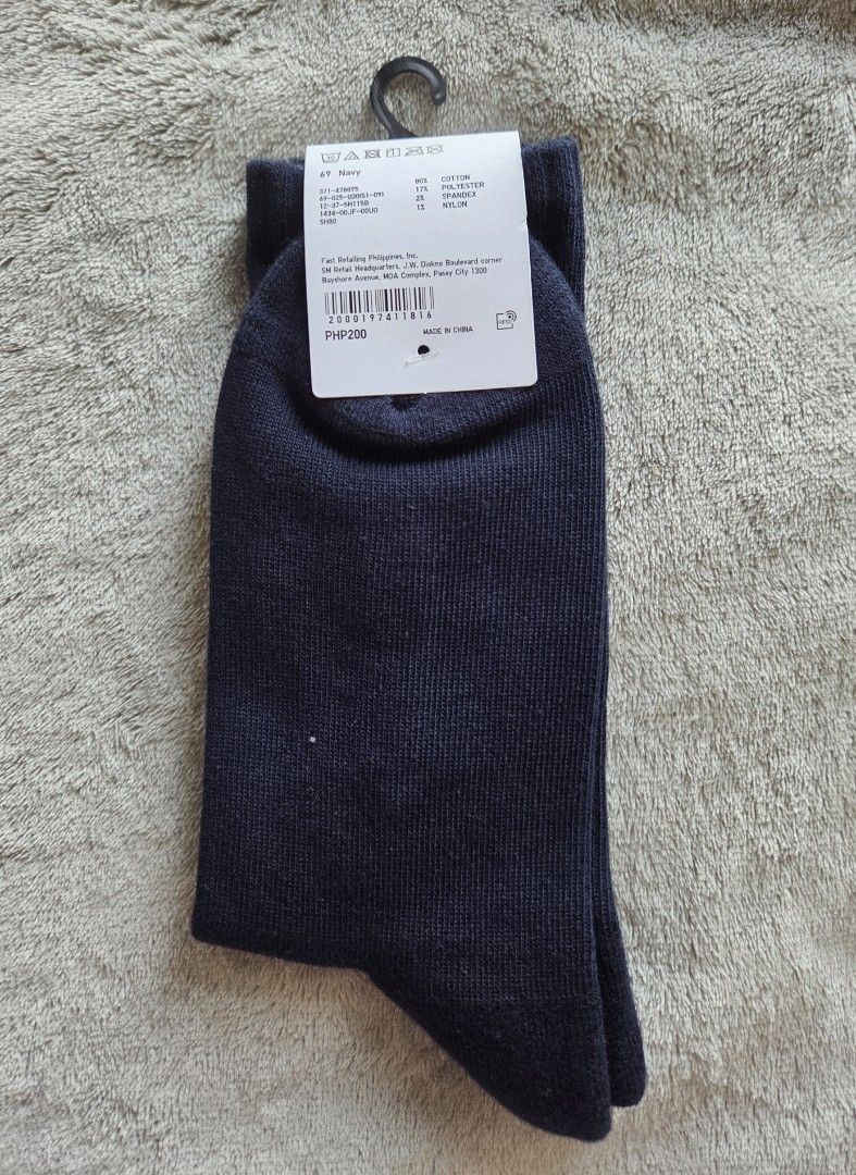 Uniqlo x Keith Haring Navy Socks (Category: Socks) located in Quezon City. Submitted by licotie (Listing ID 1445114431, Image 2). Description: - Uniqlo Keith Harring Collaboration Socks - Color: Navy Blue - Texture: Ribbed - Size: 25-27cm - Made in China.