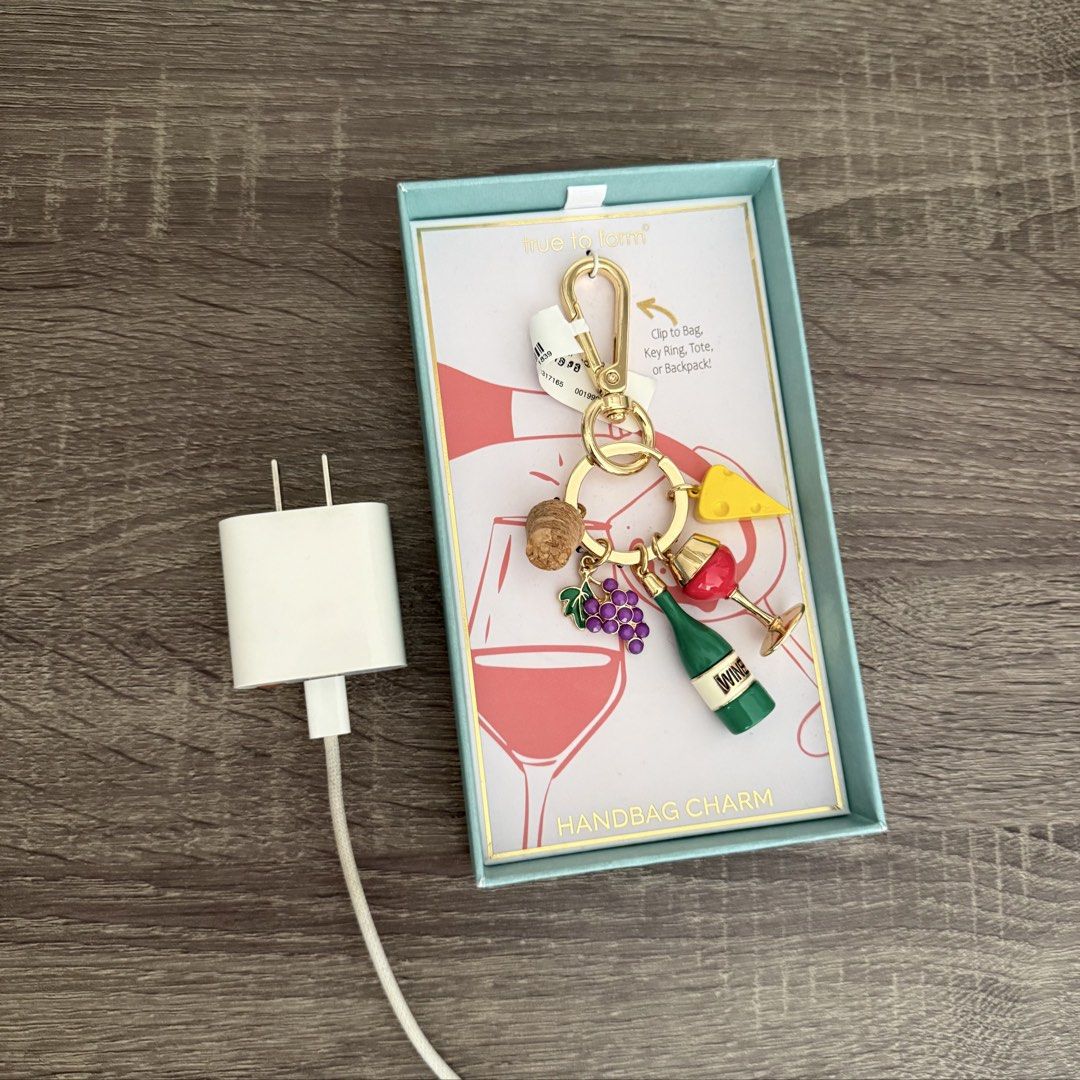 US Wine & Cheese Board Bag Charm (Category: Luxury Bags & Wallets) located in Marikina City. Submitted by .girlboss (Listing ID 1445193692, Image 2). Description: - Brand new! - Got it from US last 2025 🇺🇸 - See iphone charger as size reference - Comes in its original box.