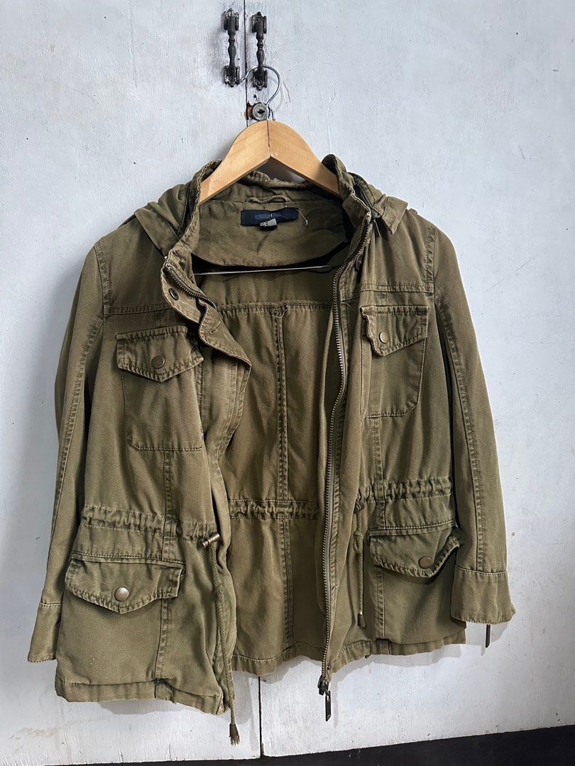 Utility Jacket (Category: Coats, Jackets and Outerwear) located in Quezon City. Submitted by janey.frank.olaivar (Listing ID 1445060021, Image 1). Description: Fits xs-s Detachable hoodie tags: jacket, army green, utility, pockets.