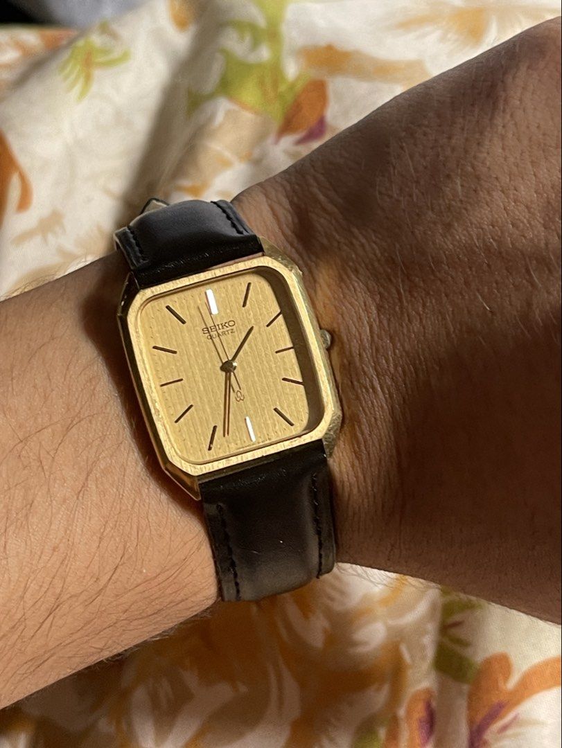 Vintage Seiko Textured Dial Tank Leather Strap (Category: Men's Watches) located in San Pablo. Submitted by newdimes (Listing ID 1445219109, Image 3). Description: Vintage Textured Dial Seiko Tank Gold Tone in good conditon Analog watch Case #: 170635 Runs on a 6030-5150 Seiko Movement Measurements: Size 19 Slim Fitting bracelet. Not local 35mm Lug to Lug 28mm Diameter Comes with replacement box for safe handling Serviced | Cleaned and ready to g