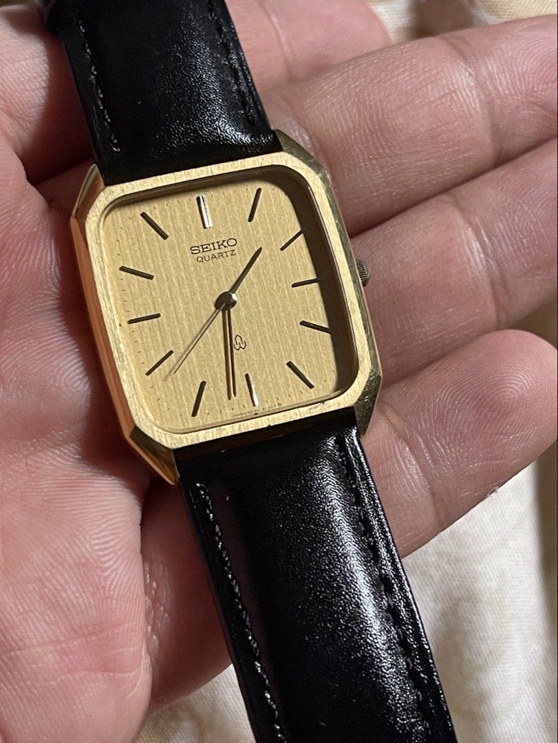 Vintage Seiko Textured Dial Tank Leather Strap (Category: Men's Watches) located in San Pablo. Submitted by newdimes (Listing ID 1445219109, Image 1). Description: Vintage Textured Dial Seiko Tank Gold Tone in good conditon Analog watch Case #: 170635 Runs on a 6030-5150 Seiko Movement Measurements: Size 19 Slim Fitting bracelet. Not local 35mm Lug to Lug 28mm Diameter Comes with replacement box for safe handling Serviced | Cleaned and ready to g