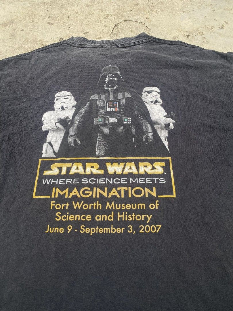 Vintage Star Wars T-Shirt (Category: Tshirts & Polo Shirts ) located in Manila. Submitted by coythrift.02 (Listing ID 1445059917, Image 2). Description: - Dark grey Star Wars t-shirt - Features the classic Star Wars logo on the chest - Comfortable and casual fit - Ideal for everyday wear - Perfect for any Star Wars enthusiast.