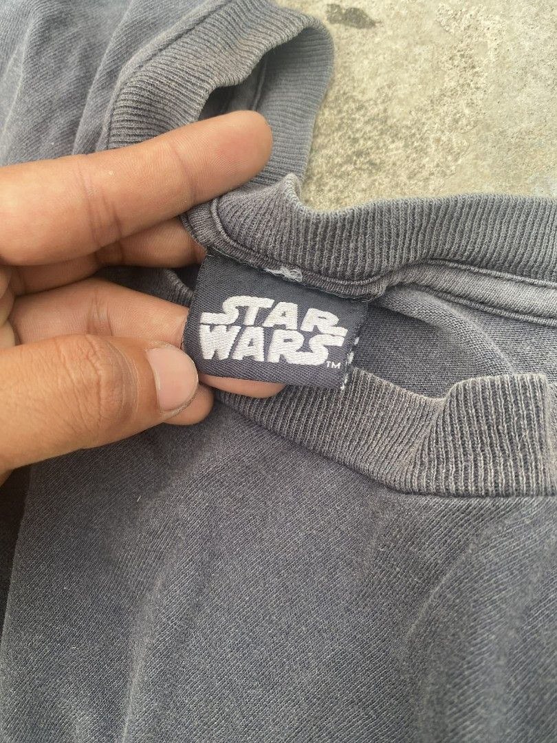 Vintage Star Wars T-Shirt (Category: Tshirts & Polo Shirts ) located in Manila. Submitted by coythrift.02 (Listing ID 1445059917, Image 3). Description: - Dark grey Star Wars t-shirt - Features the classic Star Wars logo on the chest - Comfortable and casual fit - Ideal for everyday wear - Perfect for any Star Wars enthusiast.