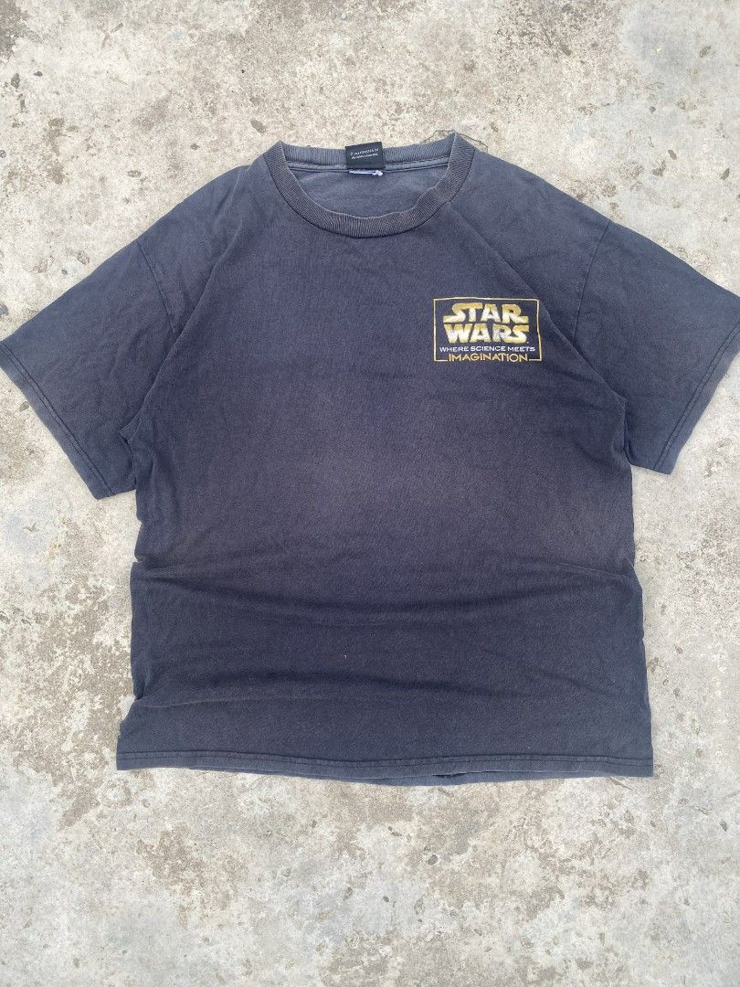 Vintage Star Wars T-Shirt (Category: Tshirts & Polo Shirts ) located in Manila. Submitted by coythrift.02 (Listing ID 1445059917, Image 1). Description: - Dark grey Star Wars t-shirt - Features the classic Star Wars logo on the chest - Comfortable and casual fit - Ideal for everyday wear - Perfect for any Star Wars enthusiast.