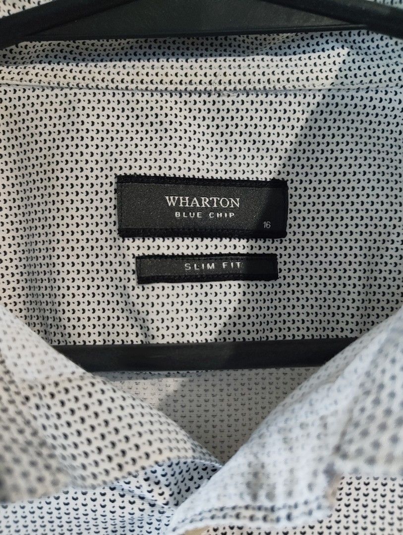 Wharton Long Sleeve Shirt (White) (Category: Formal Shirts) located in Muntinlupa City. Submitted by ea.decluttr (Listing ID 1445115055, Image 3). Description: Wharton Long Sleeve Button-Up Shirt Slim-Fit Color: White Dimes: Length: 30 Chest Width: 20 Arm Sleeve: 24.5 Shoulder: 18 Issue: Line stain (see photos).