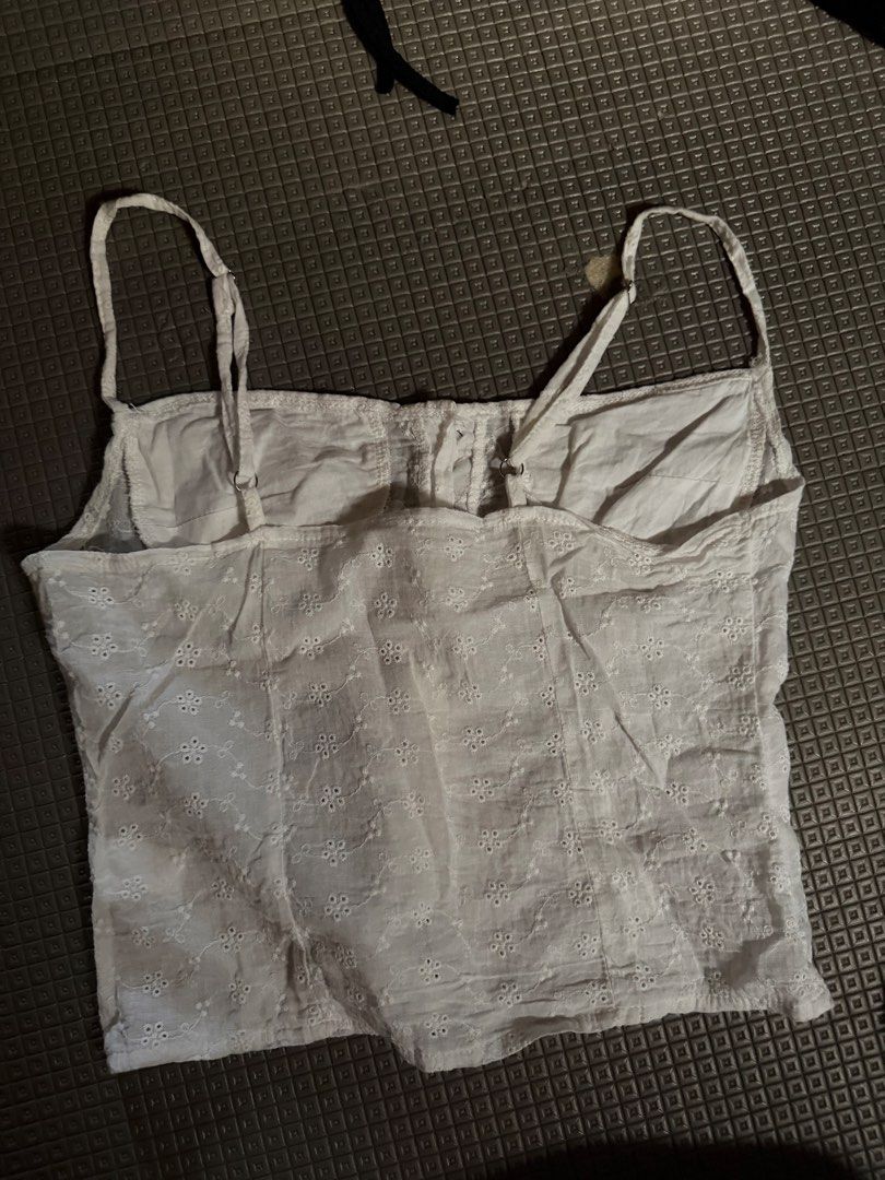 White Eyelet Button-Up Crop Top (Category: Others Tops) located in Caloocan City. Submitted by andraaa_ (Listing ID 1445179699, Image 2). Description: - White eyelet crop top - fit s-m -slightly see thru -no ww haven’t used.