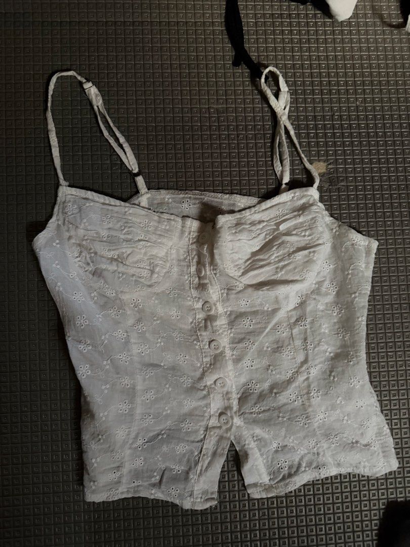 White Eyelet Button-Up Crop Top (Category: Others Tops) located in Caloocan City. Submitted by andraaa_ (Listing ID 1445179699, Image 1). Description: - White eyelet crop top - fit s-m -slightly see thru -no ww haven’t used.