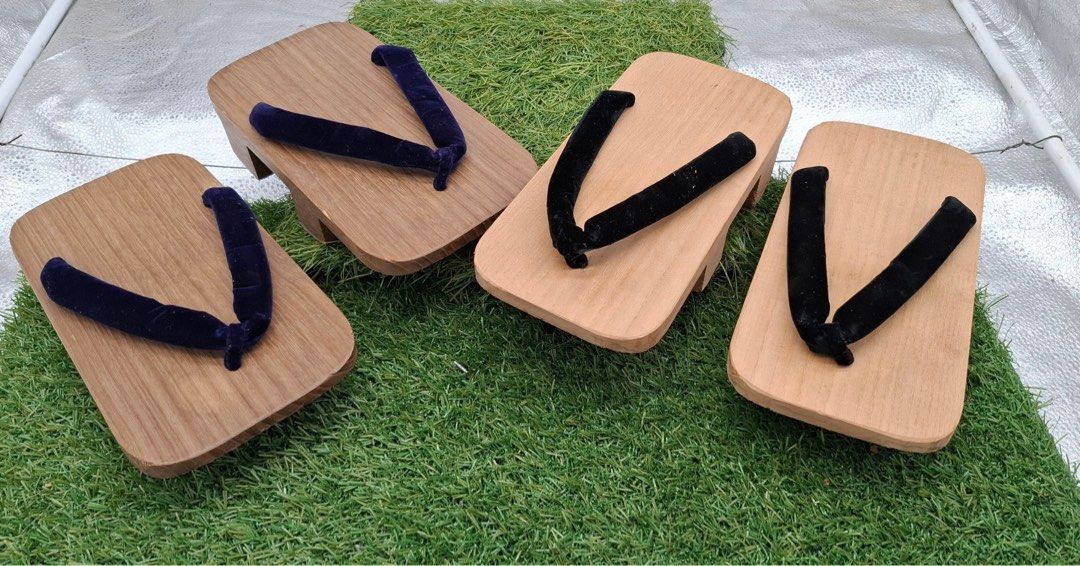 Wooden Geta Sandals with Black Straps (Category: Flats & Sandals) located in Quezon City. Submitted by eilgaraje (Listing ID 1445191048, Image 2). Description: - Traditional Japanese wooden sandals (Geta) - Features a raised wooden sole for comfort and style - Secured with comfortable black fabric straps - Perfect for cultural events, festivals, or adding a unique touch to everyday outfits - Available in multiple sizes to ensure a great fit.