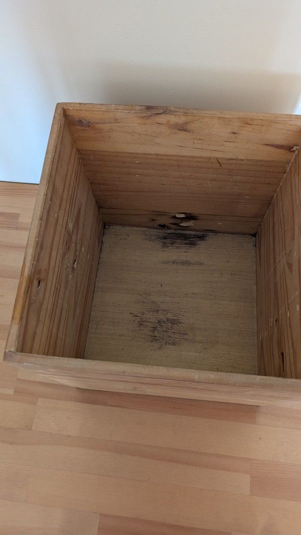 Wooden Storage Box Container Crate (Category: Storage Boxes & Baskets) located in Manila. Submitted by decluttering_9917354 (Listing ID 1445104750, Image 2). Description: - Solid wood box - Square shape - Ideal for vinyl storage - Rustic charm with signs of wear and tear - Approximate measurements: 15" x 15" x 15" - Ready for a new home.