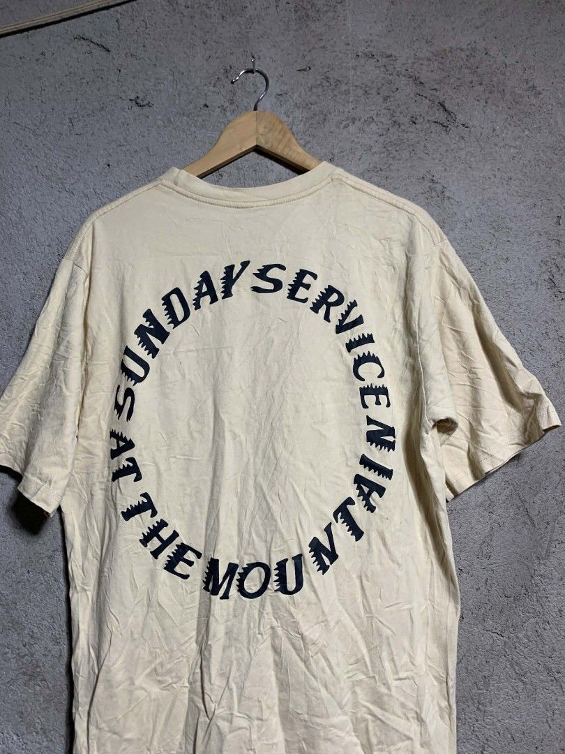 Yeezy Sunday Service At The Mountain T-Shirt (Category: Tshirts & Polo Shirts ) located in Manila. Submitted by gentlemountain.32545c (Listing ID 1445192828, Image 3). Description: - Authentic Yeezy Cream T-Shirt - Size: Large (L) - Front Graphic: 'Trust God' - Back Graphic: 'Sunday Service At The Mountain April 21 2019' - Material: 100% Cotton - Ideal for Yeezy and Kanye West fans.