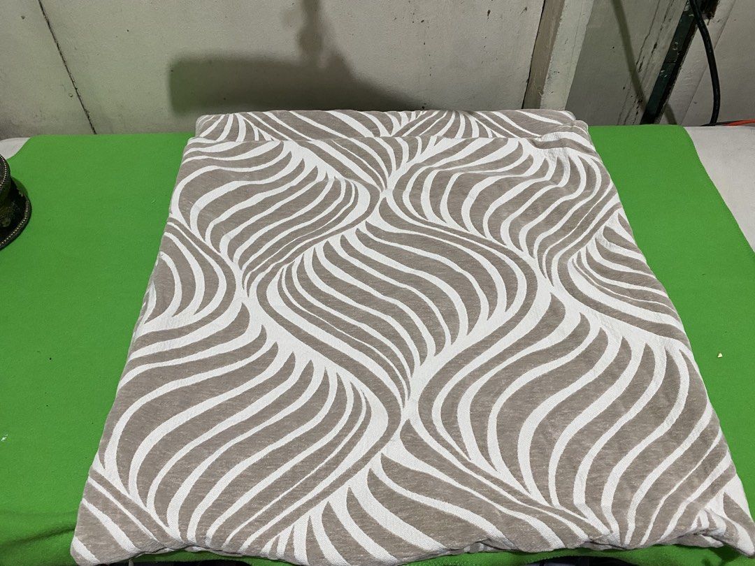 2-Pc Decorative Pillow Covers - Beige and White Swirl Pattern (Category: Bedding & Towels) located in Manila. Submitted by resi.diaz (Listing ID 1445406109, Image 1). Description: - sold as a set - Beige and white swirl pattern - Textured fabric feel - Approx. 22 x 22 inches - Perfect for a modern sofa or bed - Pillow insert not included - Clean and ready for a new home.