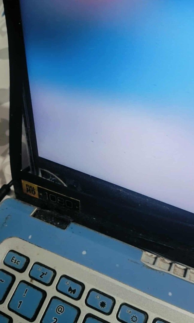 Acer Laptop i3-1115G4 (Category: Laptops & Notebooks) located in Quezon City. Submitted by sunnyshan1234 (Listing ID 1408242396, Image 3). Description: - Acer laptop with custom blue and pink skin - Intel Core i3-1115G4 processor - 8GB RAM - Includes a USB port - Screen displays system information.