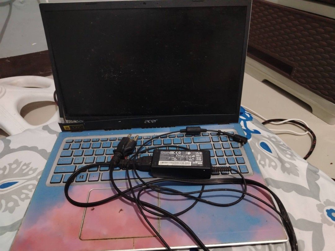 Acer Laptop i3-1115G4 (Category: Laptops & Notebooks) located in Quezon City. Submitted by sunnyshan1234 (Listing ID 1408242396, Image 1). Description: - Acer laptop with custom blue and pink skin - Intel Core i3-1115G4 processor - 8GB RAM - Includes a USB port - Screen displays system information.