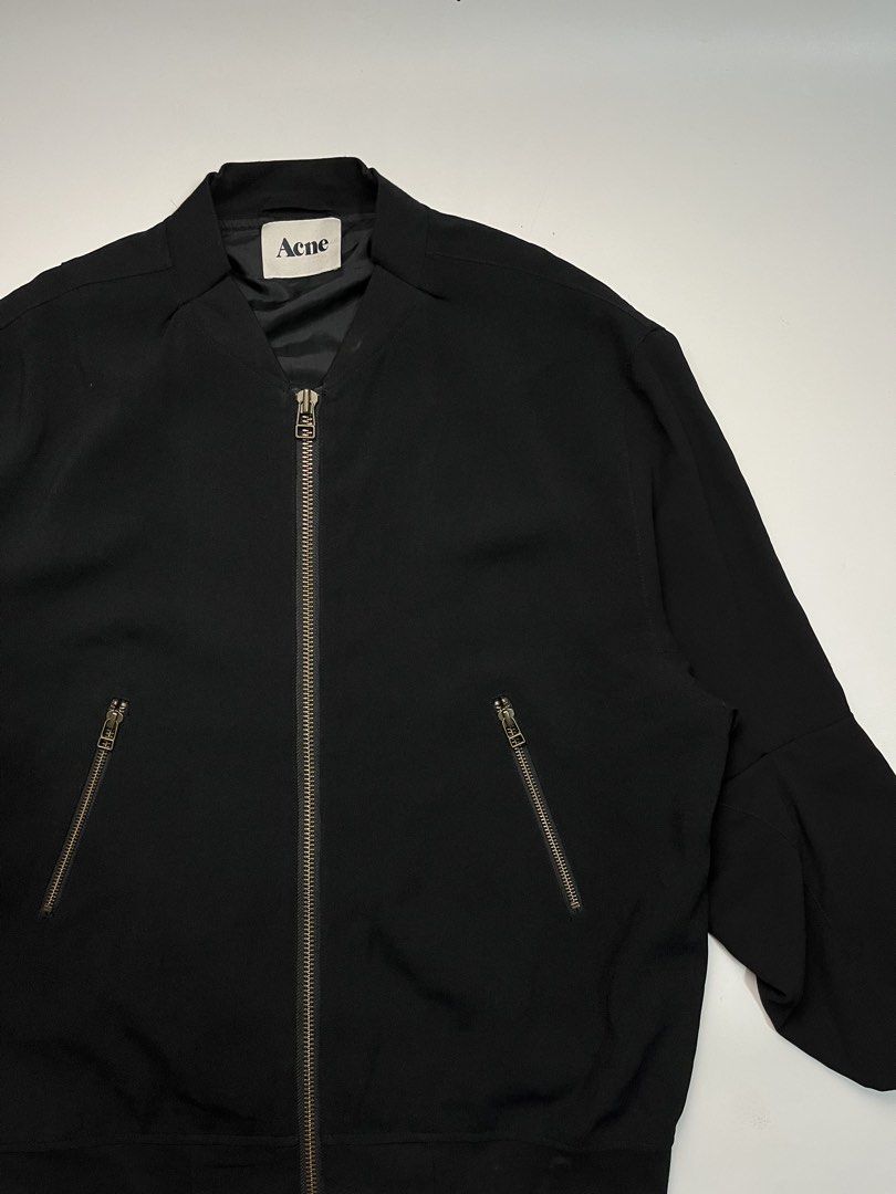 Acne Studios FW10 “Tension” Tied Bomber Jacket (Category: Coats, Jackets and Outerwear) located in Manila. Submitted by streetsavvy (Listing ID 1445328966, Image 3). Description: Acne Studios FW10 “Tension” Tied Bomber Jacket Size: 34 Width: 22” Length: 27” Shoulder: 19” Sleeve Length: 22” Hem: 18” Measured in Inches An incredible, rare piece of archival Acne minimalism from 2010. The “Tension” bomber features a classic flight jacket silhouette u