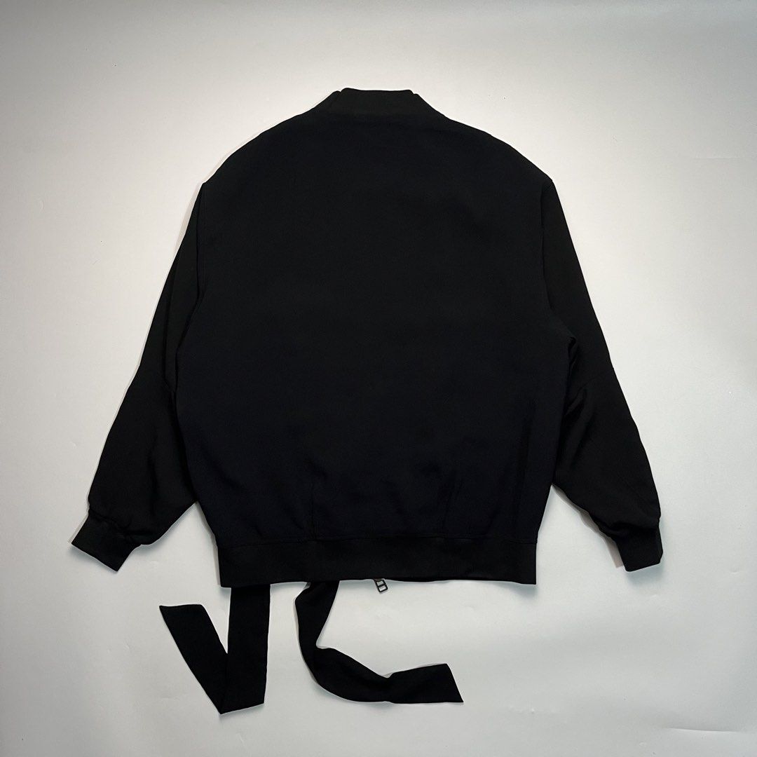 Acne Studios FW10 “Tension” Tied Bomber Jacket (Category: Coats, Jackets and Outerwear) located in Manila. Submitted by streetsavvy (Listing ID 1445328966, Image 2). Description: Acne Studios FW10 “Tension” Tied Bomber Jacket Size: 34 Width: 22” Length: 27” Shoulder: 19” Sleeve Length: 22” Hem: 18” Measured in Inches An incredible, rare piece of archival Acne minimalism from 2010. The “Tension” bomber features a classic flight jacket silhouette u