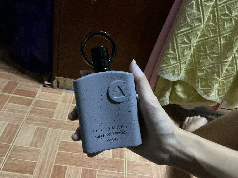 AFNAN Supremacy Collector's Edition Eau de Parfum (Category: Fragrance & Deodorants) located in Manila. Submitted by austine990 (Listing ID 1445410040, Image 2). Description: - AFNAN Supremacy Collector's Edition - Black spray nozzle and ring handle - Designed for fragrance collectors -90%+ juice level - no box mod -lalamove 50% for refund .