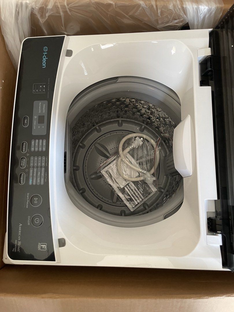 American Home AWF-M7020D Fully Auto Washing Machine (Category: Washing Machines and Dryers) located in Manila. Submitted by angelgmalle (Listing ID 1445406787, Image 3). Description: - American Home Fully Automatic Washing Machine - Model: AWF-M7020D - Capacity: 7.0 kg - Features: Strong Pulsator, Tub Clean, Adjustable Leg - Tub Material: Stainless Steel - Display: Electronic - Includes: Hoses and Manual - Condition: Brand new, still in original 