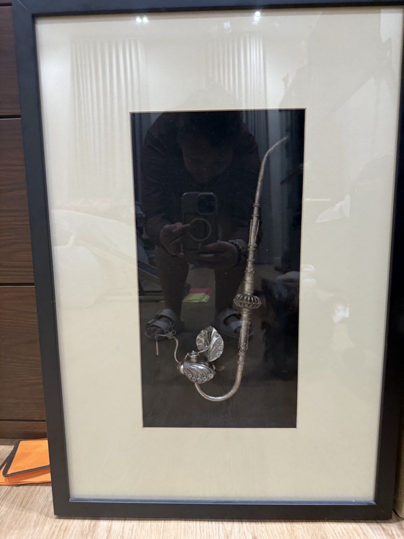 Antique Silver Pipe and Object Framed Art (Category: Frames & Pictures) located in Pasig City. Submitted by happydragon_07d654 (Listing ID 1445408724, Image 1). Description: - Framed artwork with an antique silver pipe. - Classic black frame with cream matting. - Unique decorative piece for your wall. - Guaranteed conversation starter. - [Insert dimensions here if known].