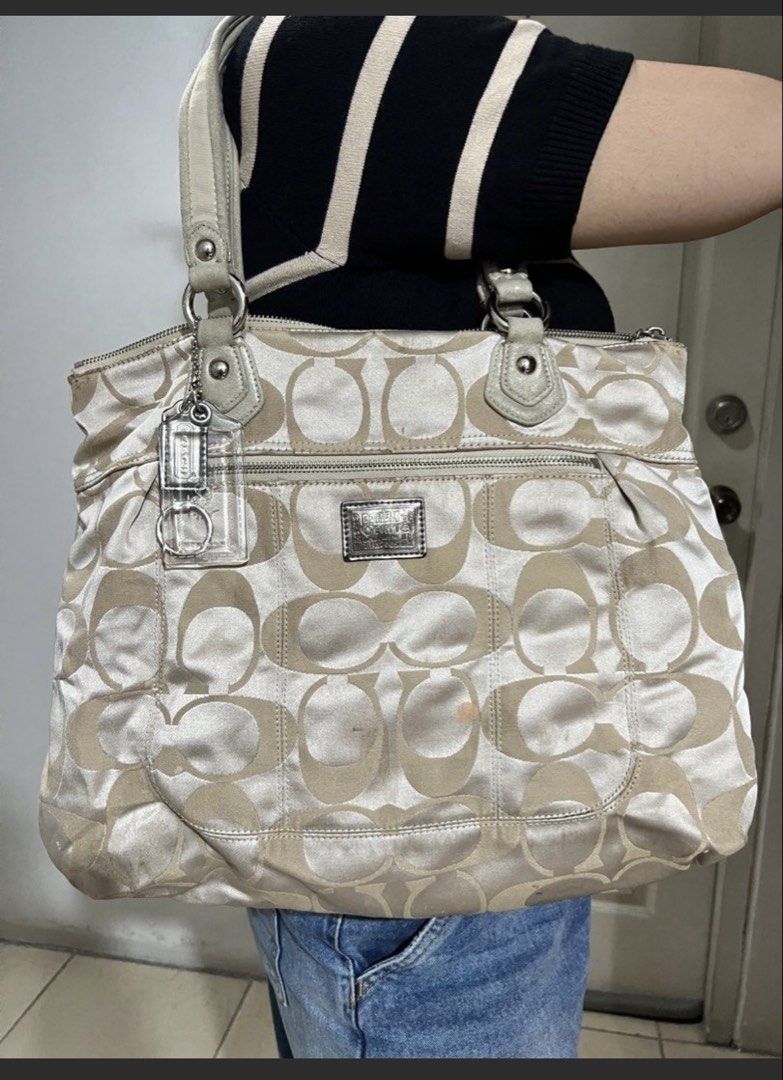 Authentic Coach Poppy Glam Tote Bag (Category: Luxury Bags & Wallets) located in Manila. Submitted by deoksun (Listing ID 1445356715, Image 3). Description: COACH Poppy Glam Tote Bag in Gold Metallic Beige 17890 Aqua Satin Lining Handle Drop 7.5” Height 13.75” Width 14.25” Depth 3” .