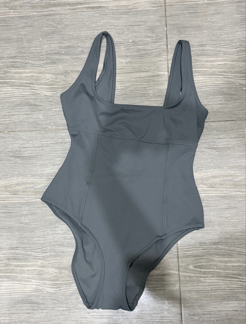 Authentic SKIMS Sculpting Swim Tank One Piece (Category: Bikinis & Swimsuits) located in Iligan City. Submitted by jytomps (Listing ID 1445367013, Image 1). Description: - SKIMS Fits Everybody one-piece swimsuit - Size: L - Design: Flattering square neckline - Material: Comfortable and stretchy nylon-spandex blend - Perfect for: Swimming or lounging - from the Us bought by my mom di kasya so letting it go… -RFS need funds for travel - price still