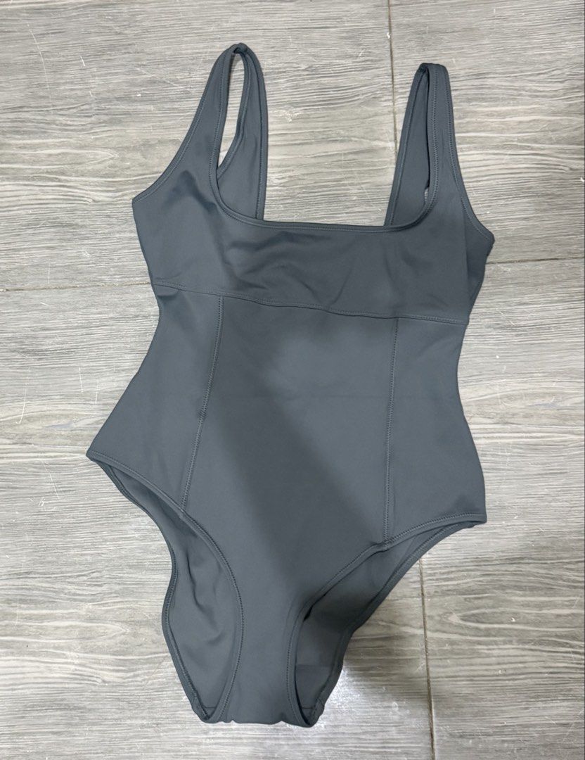 Authentic SKIMS Sculpting Swim Tank One Piece (Category: Bikinis & Swimsuits) located in Iligan City. Submitted by jytomps (Listing ID 1445367013, Image 2). Description: - SKIMS Fits Everybody one-piece swimsuit - Size: L - Design: Flattering square neckline - Material: Comfortable and stretchy nylon-spandex blend - Perfect for: Swimming or lounging - from the Us bought by my mom di kasya so letting it go… -RFS need funds for travel - price still