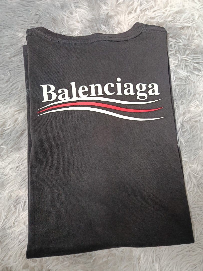 Balenciaga black T shirt (Category: Tshirts & Polo Shirts ) located in Quezon City. Submitted by tedthrift (Listing ID 1445261470, Image 2). Description: size xl no issue brand-new condition10/10 may effect lang dahil sa liwanag.