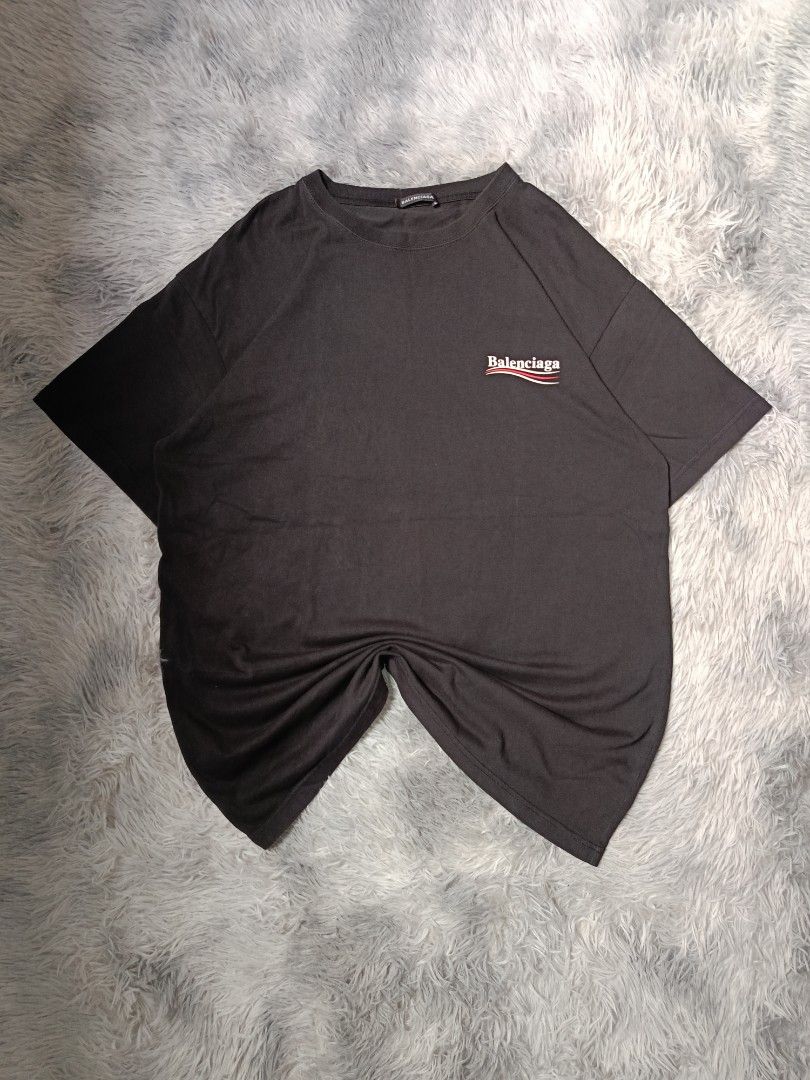 Balenciaga black T shirt (Category: Tshirts & Polo Shirts ) located in Quezon City. Submitted by tedthrift (Listing ID 1445261470, Image 1). Description: size xl no issue brand-new condition10/10 may effect lang dahil sa liwanag.