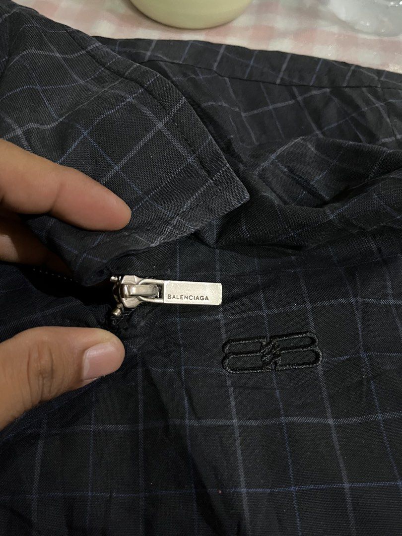 Balenciaga Paris Checkered Bomber Jacket (Category: Coats, Jackets and Outerwear) located in Davao. Submitted by streetsight (Listing ID 1445359082, Image 3). Description: -authentic Ciaga, What you see is what you get - Balenciaga Paris checkered jacket - Size 5 - Zip-up front with silver zipper pull - Balenciaga logo on zipper pull - Embroidered Balenciaga logo on chest - Ideal for layering.
