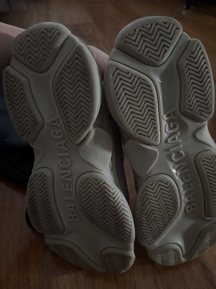 Balenciaga Triple S Sneakers Size 38 (Category: Sneakers) located in Pasig City. Submitted by npl123 (Listing ID 1445301608, Image 3). Description: - Balenciaga Triple S Sneakers - Color: Light Beige - Size: 38 - Features: Iconic chunky design, signature layered sole - Branding: Balenciaga logo on side and sole - Detail: Size '38' visible on toe box - Style: Ideal for everyday wear.