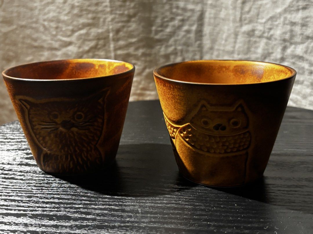 Beautiful Rustic Brown Glaze Finish Cat Ceramic Cup Set for Sale (Category: Dinnerware & Cutlery) located in Kampar. Submitted by liz5828 (Listing ID 1445389088, Image 2). Description: Add a touch of warmth and charm to your coffee or tea moments with this adorable ceramic cup set featuring cute cat designs. Size (Each Cup): 9cm (W) × 9cm (L) × 7cm (H) Set Includes: • 2 Ceramic Cups Suitable for: • Daily coffee or tea drinking • Gifts for cat lov
