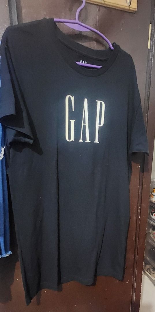 Black GAP DRESS with White Logo (Category: Tshirts & Polo Shirts ) located in Manila. Submitted by 09mk8967 (Listing ID 1445265781, Image 1). Description: - Classic black GAP t-shirt - Features iconic white GAP logo on front - Simple and versatile design - Ideal for casual wear - Pairs easily with jeans or shorts - width 21" -.length 36" LARGE TO XL .