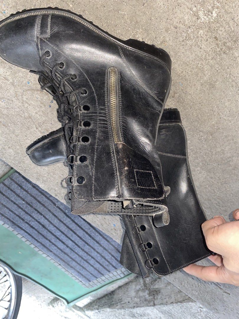 Black Leather Lace-Up Combat Boots with Side Zipper (Category: Boots) located in Pasay City. Submitted by 4zalea (Listing ID 1445333060, Image 3). Description: - Black leather mid-calf boots - Lace-up front with convenient side zipper - Soles appear sturdy and durable - Versatile for everyday wear or as a fashion statement.