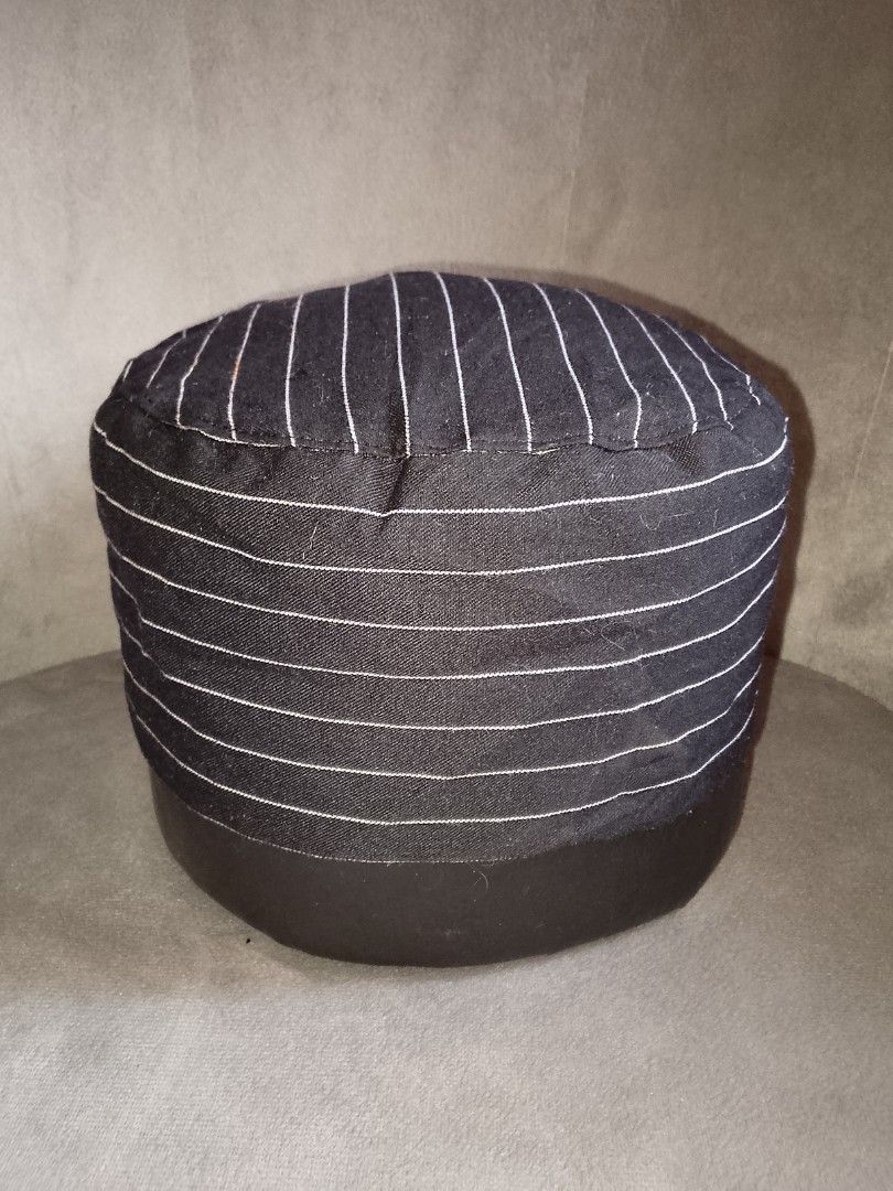 Black Pinstripe Chef Hat with Fork and Knife Logo (Category: Caps & Hats) located in Binangonan. Submitted by yuristalin888 (Listing ID 1445245747, Image 1). Description: - Stylish black chef hat with subtle white pinstripes. - Features a small embroidered fork and knife logo on the side. - Elasticated back ensures a comfortable and secure fit for all sizes. - Ideal for culinary professionals, aspiring chefs, or themed events. - Designed for easy