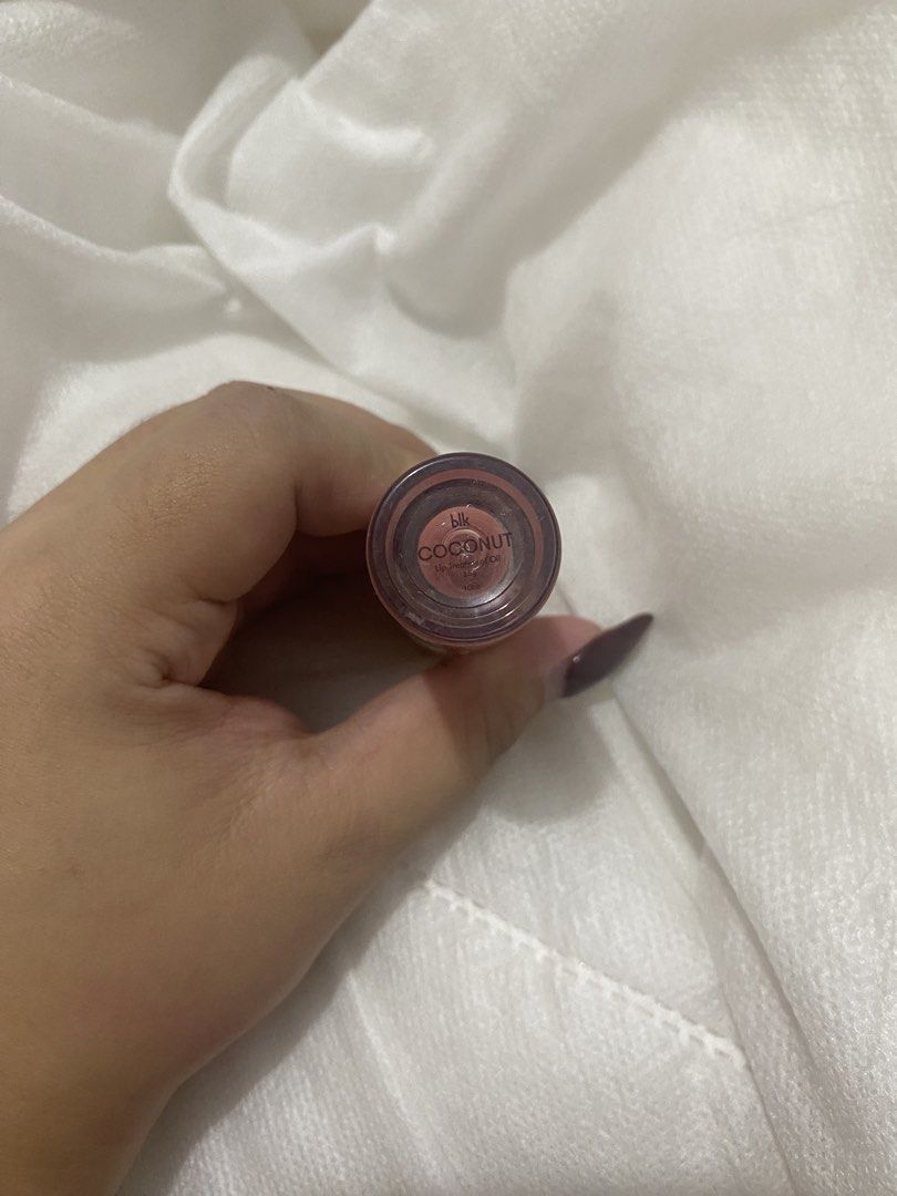 BLK cosmetics lip oil - Coconut (Category: Makeup) located in Manila. Submitted by saaaaabrina (Listing ID 1445271832, Image 2). Description: - authentic - lots of product left pa - rfs: decluttering - theres basag lang sa cap hence selling low can do jnt and orange app co for delivery ! .