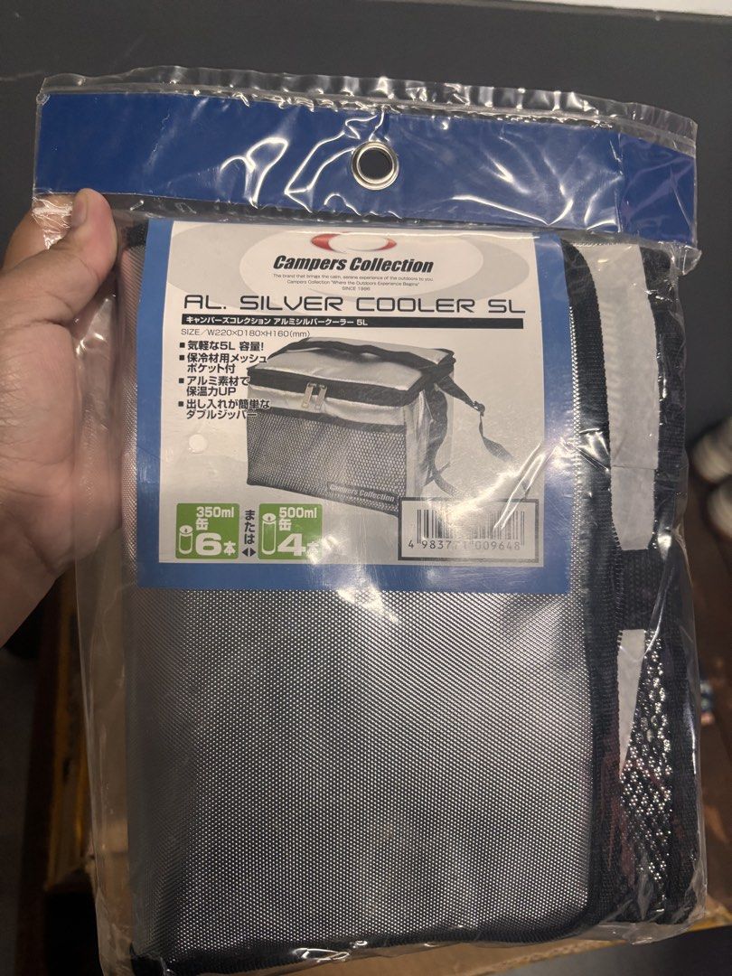 Campers Collection SILVER COOLER SL 5L Cooler Bag (Category: Hiking & Camping) located in Baliuag. Submitted by importeditemsbykimi (Listing ID 1445336310, Image 2). Description: - Lightweight 5L cooler bag from Campers Collection - Made with aluminum for superior insulation - Convenient mesh pocket for extra storage - Double zipper for easy access - Capacity: 6 x 350ml cans or 4 x 500ml bottles - Ideal for picnics, beach trips, and outdoor adven