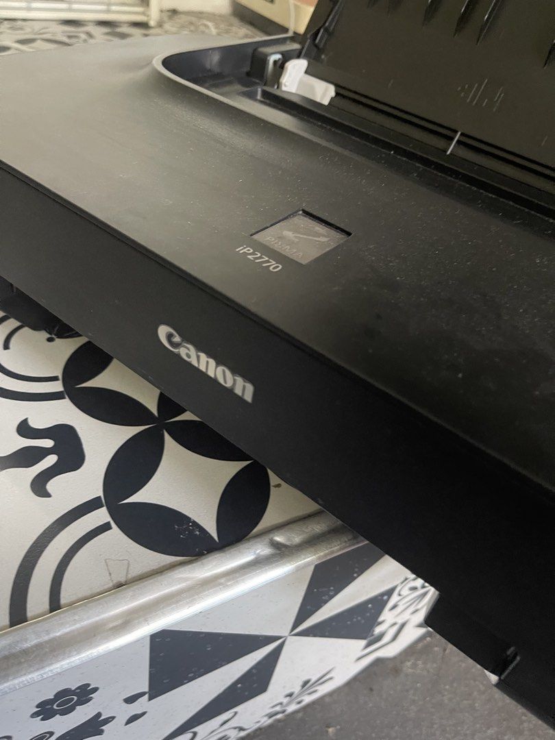 Canon PIXMA iP2770 Inkjet Printer (Category: Printers, Scanners & Copiers) located in Manila. Submitted by raresoft (Listing ID 1445320364, Image 3). Description: - Color: Black - Features attached external ink tanks for extended printing - Been in stock mode for 6months now, will need a technician to check if working. Won’t connect to my computer kasi. -comes with the power cord and comp connection. - Sold as is, pls manage your expectations on 