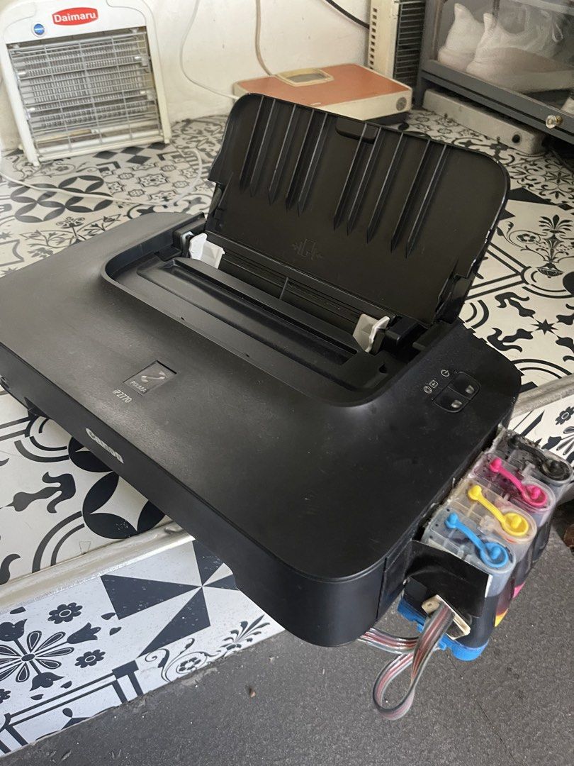 Canon PIXMA iP2770 Inkjet Printer (Category: Printers, Scanners & Copiers) located in Manila. Submitted by raresoft (Listing ID 1445320364, Image 2). Description: - Color: Black - Features attached external ink tanks for extended printing - Been in stock mode for 6months now, will need a technician to check if working. Won’t connect to my computer kasi. -comes with the power cord and comp connection. - Sold as is, pls manage your expectations on 