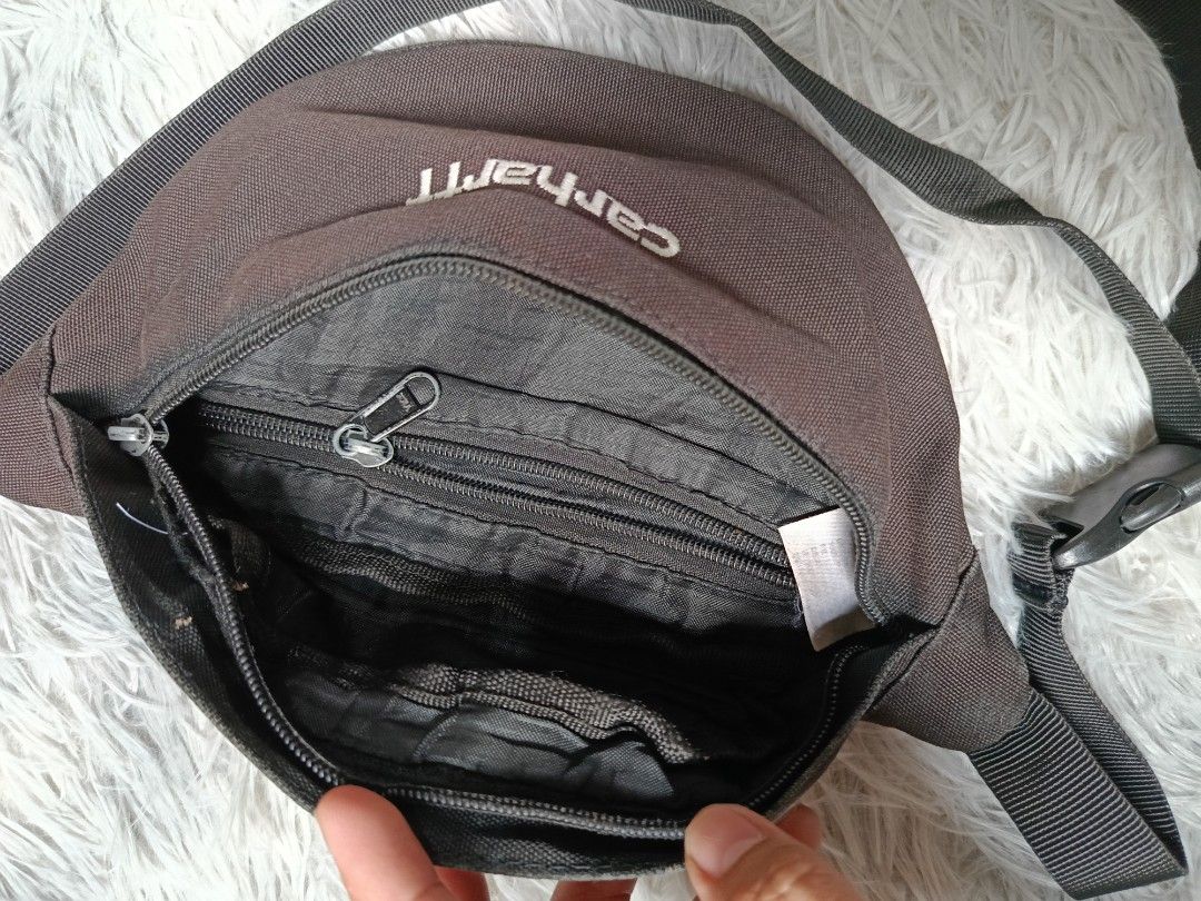 Carhartt WIP Payton Hip Bag (Category: Belt bags, Clutches and Pouches) located in Quezon City. Submitted by tedthrift (Listing ID 1445260971, Image 3). Description: issue are posting handle zipper and need repair.