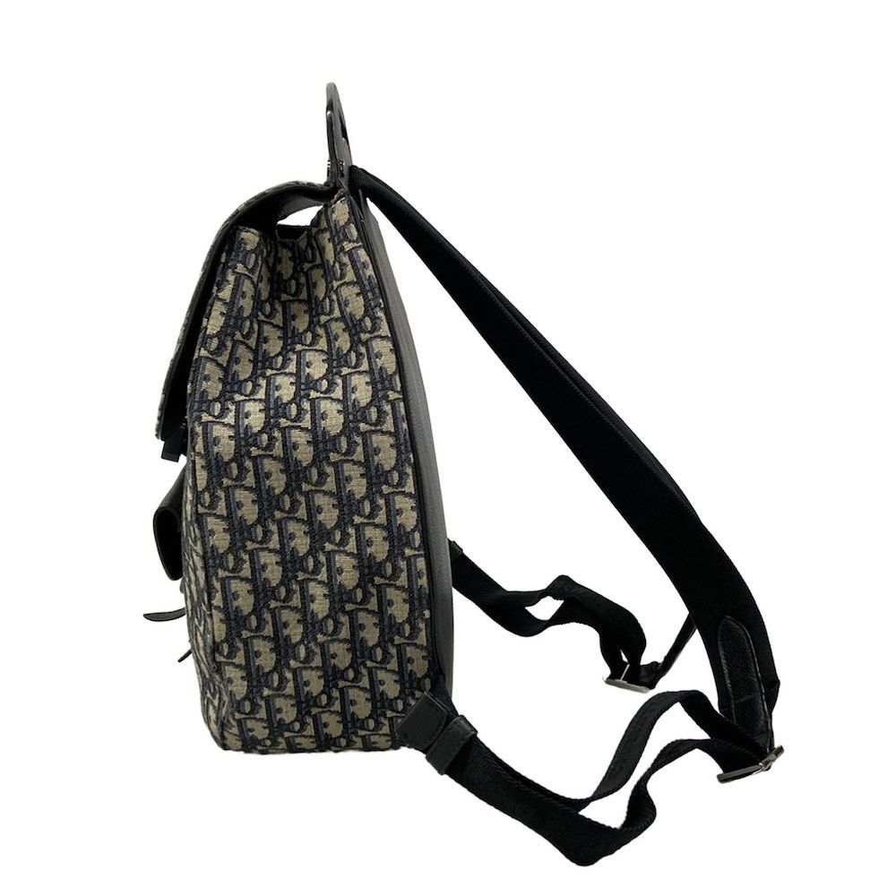 Christian Dior Dior / Leather Backpack (Category: Luxury Bags & Wallets) located in Las Pinas. Submitted by daisuki_japan_luxury_by_reiko (Listing ID 1445351946, Image 3). Description: Condition Notes [Exterior] Overall: Scratches / Stains / Discoloration / Fading (some discoloration) / Loss of shape (inner core deterioration on the front) / Hardware deterioration ; Main opening: Corner scuffs / Fabric deterioration (slight cracking in the varnis