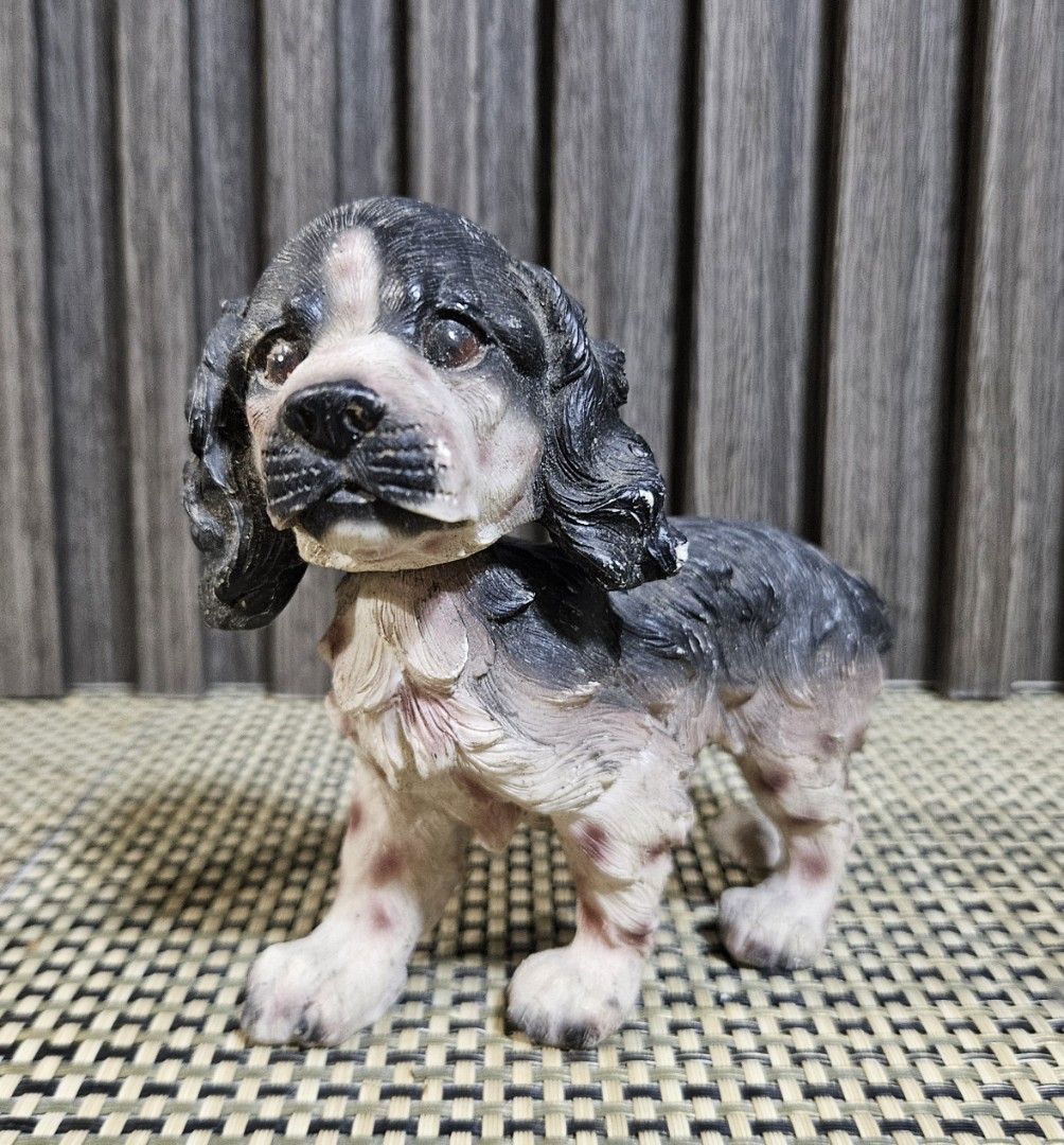 Cocker Spaniel Dog Bobble Head Figurine Statue (Category: Figurines & Statues) located in Rizal. Submitted by cherry_garcia (Listing ID 1445320990, Image 1). Description: - Adorable vintage dog figurine - Resembles a Cocker Spaniel - Black and white coloring with subtle pinkish tones on legs and chest - Features a unique textured finish - Ideal for dog figurine collectors or as a charming decorative piece - Stands approximately 4 inches tall.