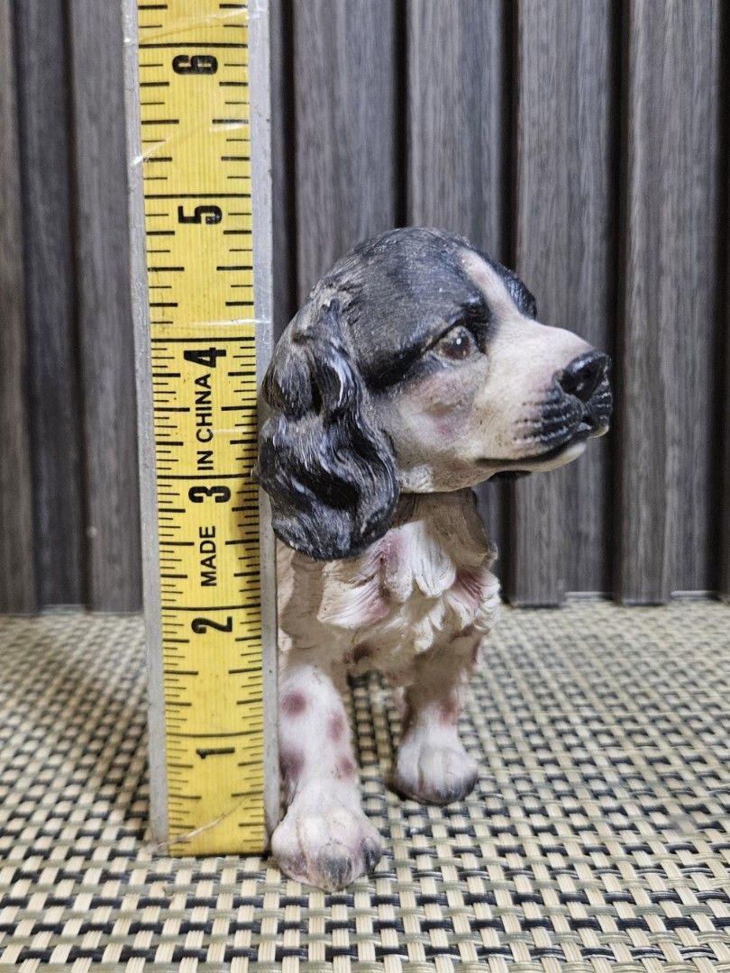 Cocker Spaniel Dog Bobble Head Figurine Statue (Category: Figurines & Statues) located in Rizal. Submitted by cherry_garcia (Listing ID 1445320990, Image 2). Description: - Adorable vintage dog figurine - Resembles a Cocker Spaniel - Black and white coloring with subtle pinkish tones on legs and chest - Features a unique textured finish - Ideal for dog figurine collectors or as a charming decorative piece - Stands approximately 4 inches tall.